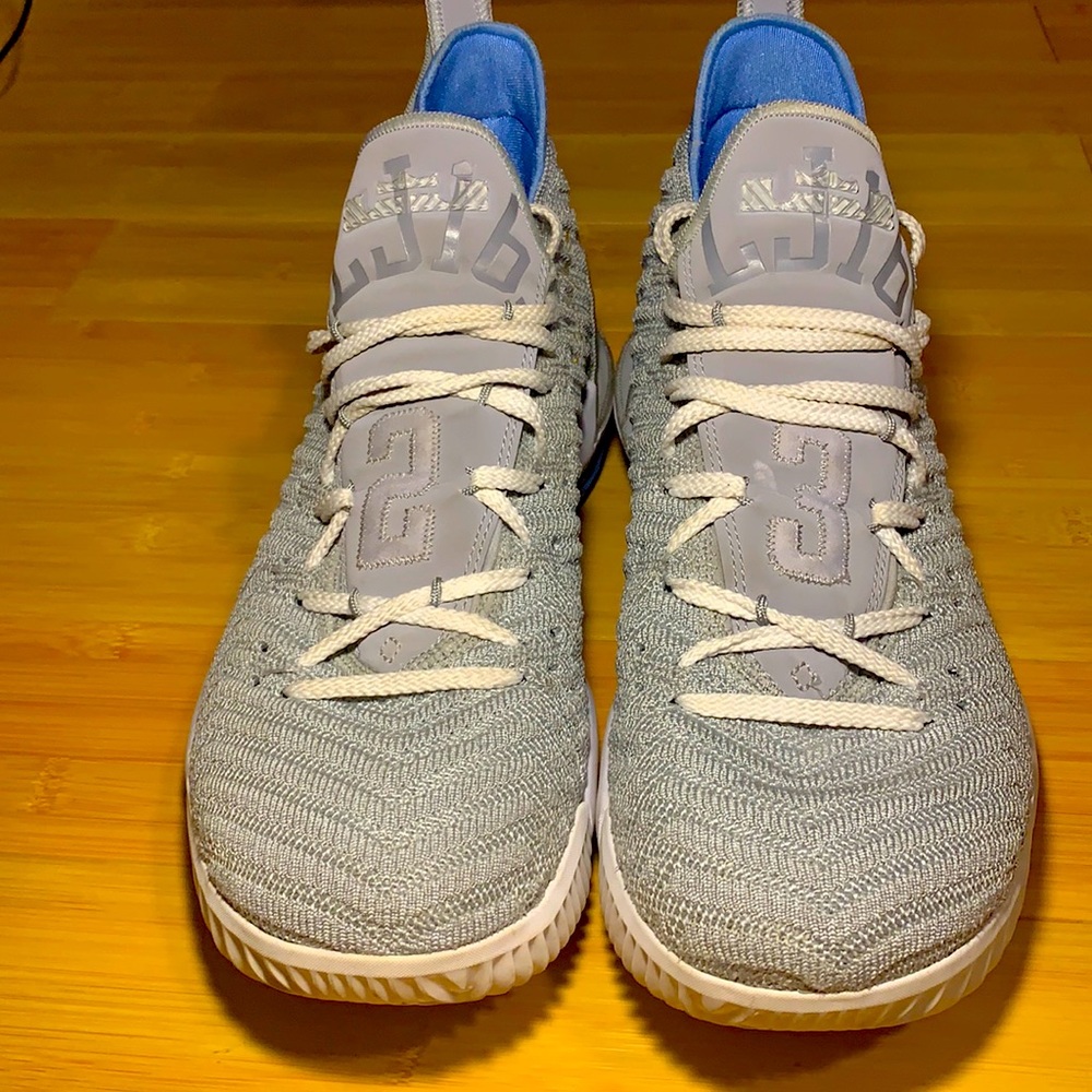 Grey blue and gold Nike LeBron basketball shoes